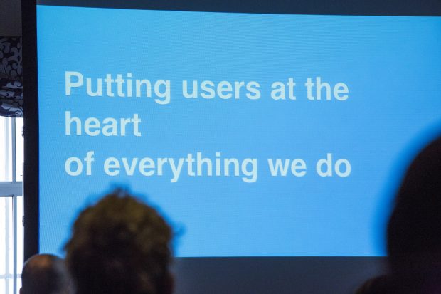 A picture of a presentation slide saying "Putting users at the heart of everything we do"