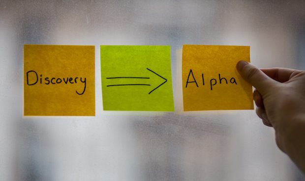 The words discovery and alpha on sticky notes